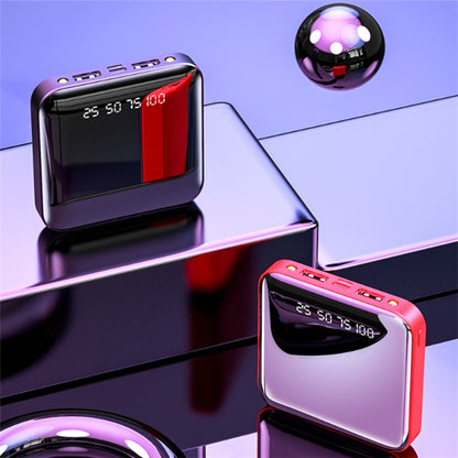 Two electronic devices with digital displays on a reflective surface with a purple gradient background.