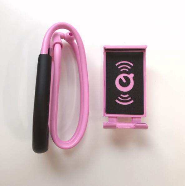 Pink dog leash with a black handle and a matching pink phone holder on a white background