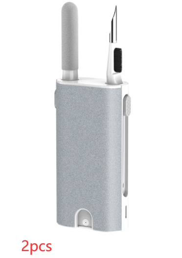 Gray electronic device with two attachments on a white background