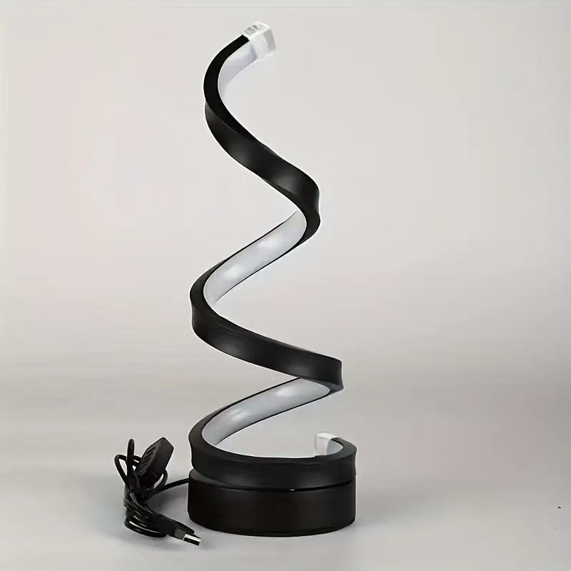Spiral lamp with black and white design on a light gray background