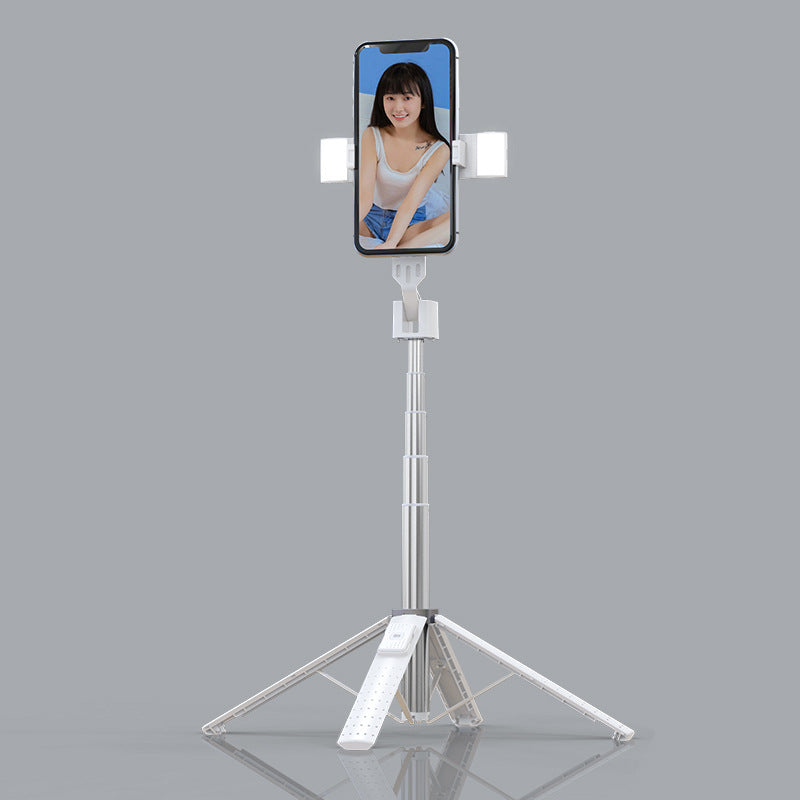Phone holder with a smartphone displaying a woman's face on a gray background