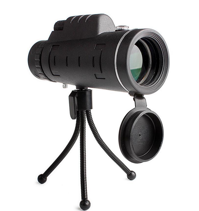 Black monocular with a tripod on a white background
