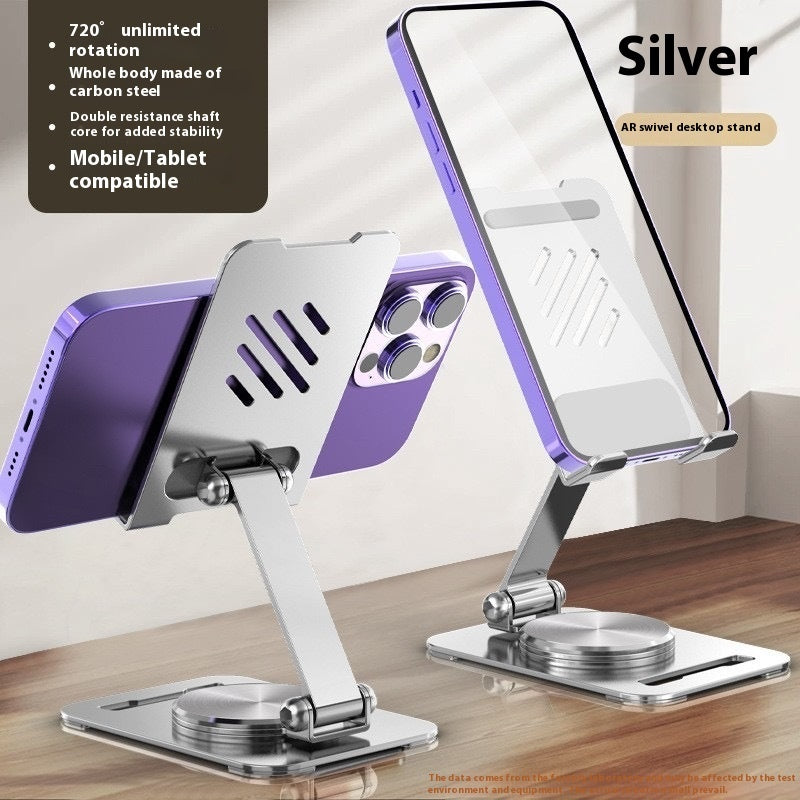 Silver phone stand with purple phone on a wooden surface