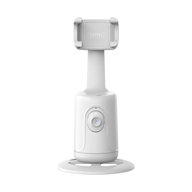 White handheld device with a suction cup on a white background