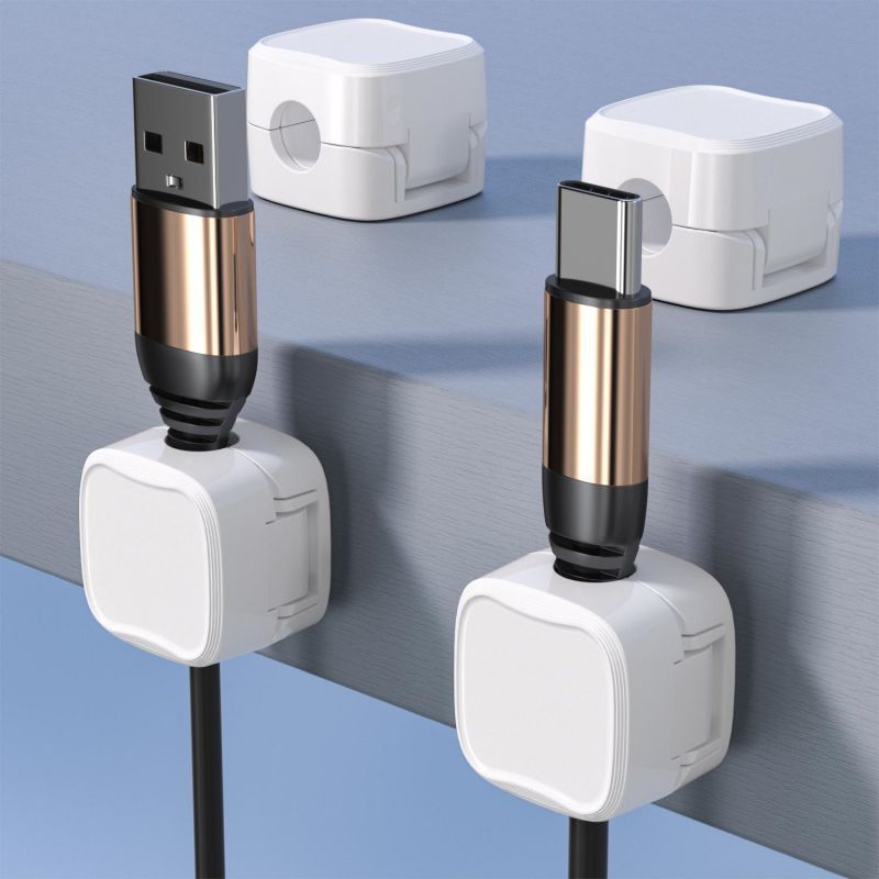 Two USB connectors on a metallic surface with a blue gradient background