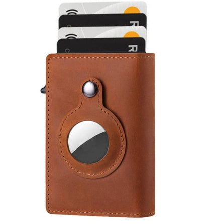 Brown leather cardholder with circular design on a white background