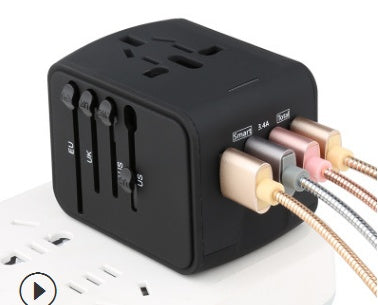 Black travel adapter with multiple plug sockets on a white background