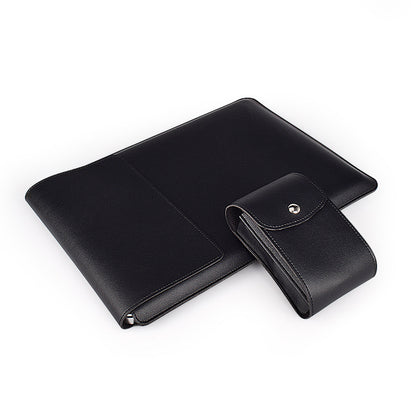Black leather planner and smaller black leather case on a white background