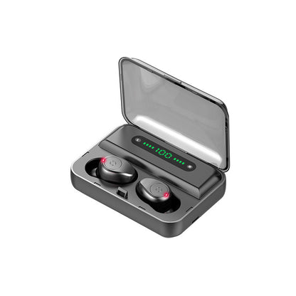 Black wireless earbuds in a charging case with a digital display on a white background