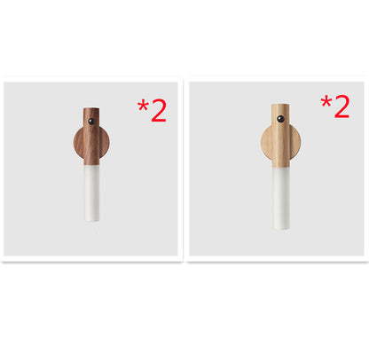 Two wooden and white cylindrical objects with a '2' label on a white background