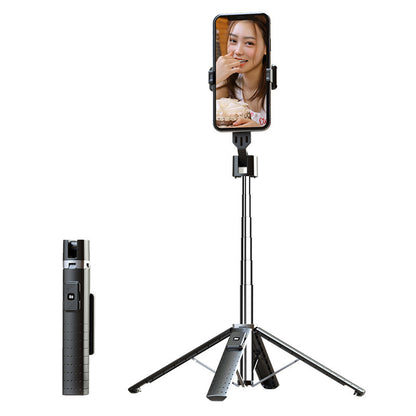 Phone holder with tripod and remote control on a white background
