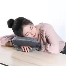 Woman using a footrest on a desk with a plain background