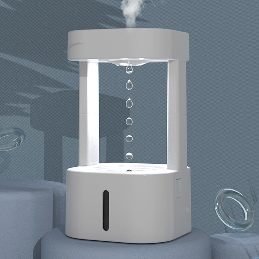 White humidifier emitting mist on a gray background