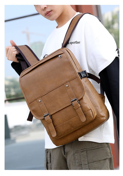 Person wearing a brown backpack outdoors