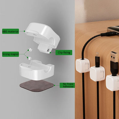 White cable management clip with features highlighted on a gray background, showing its use on a wooden surface.