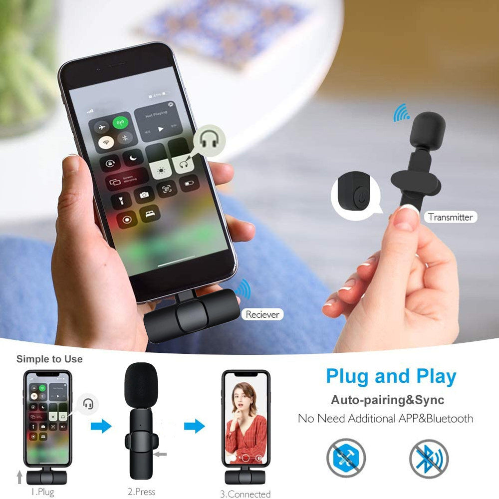 Hands holding a smartphone with a wireless microphone setup, showing the transmitter and receiver components.