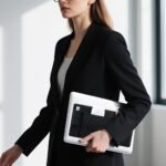high end lycra fabric + faux leather mouse storage bag, featuring three pockets that can hold two mice, a capacitive stylus, and other electronic pens. this self adhesive multifunctional storage pouch is suitable for various computers, ipads