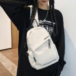 a stylish and lightweight sling backpack designed for sporty travel, featuring a sturdy zipper and comfortable fabric, perfect for everyday use and as gifts for christmas and new year