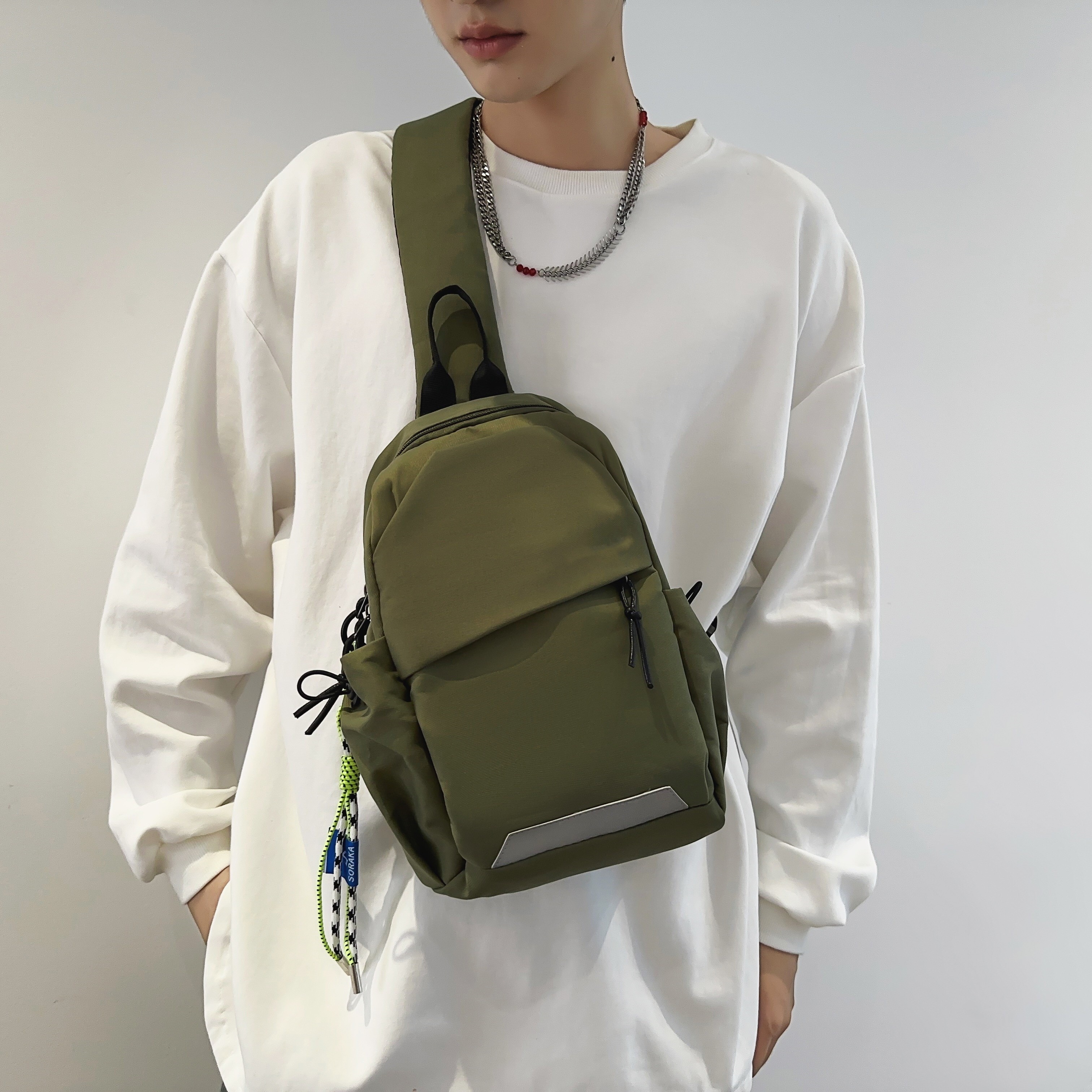 a stylish and lightweight sling backpack designed for sporty travel, featuring a sturdy zipper and comfortable fabric, perfect for everyday use and as gifts for christmas and new year